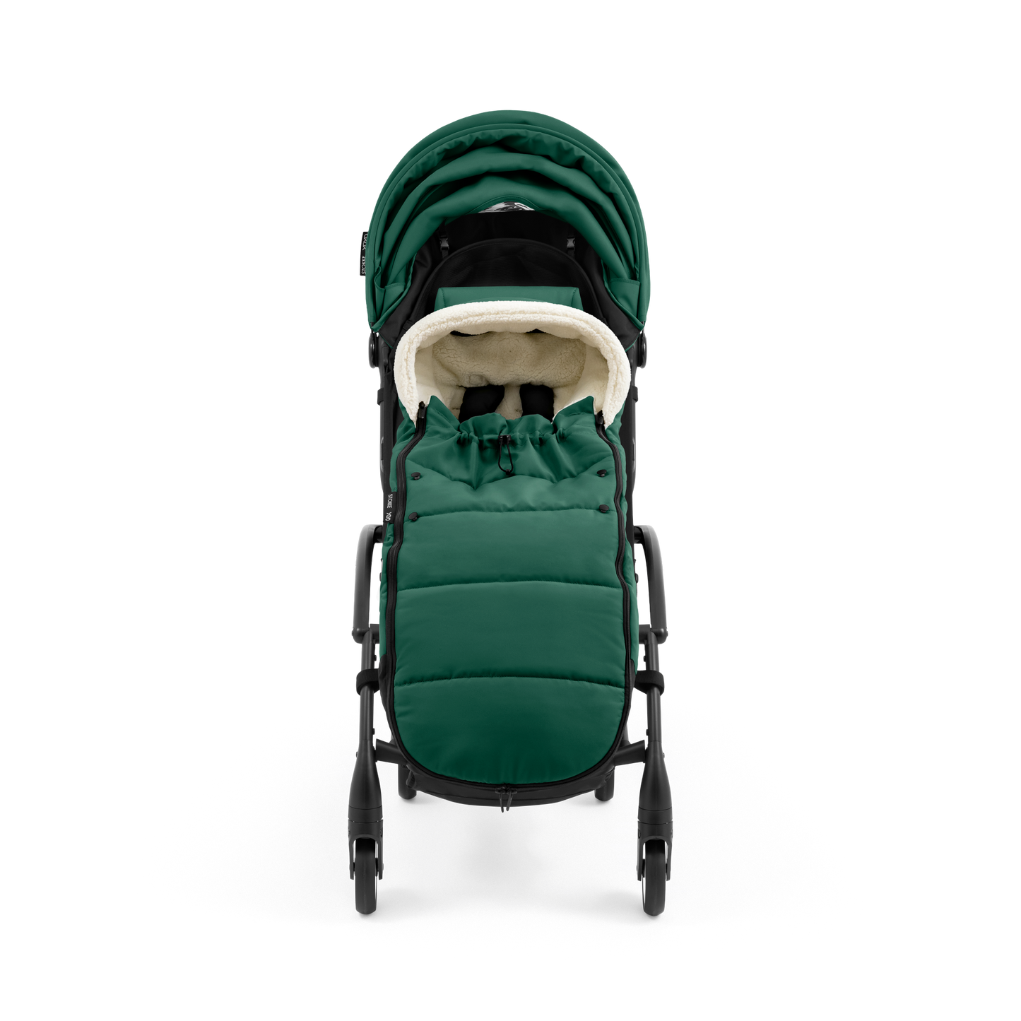 A stroller with a forest green colored padded footmuff, cream fleece lining, and a black frame, shown from the front on a white background.