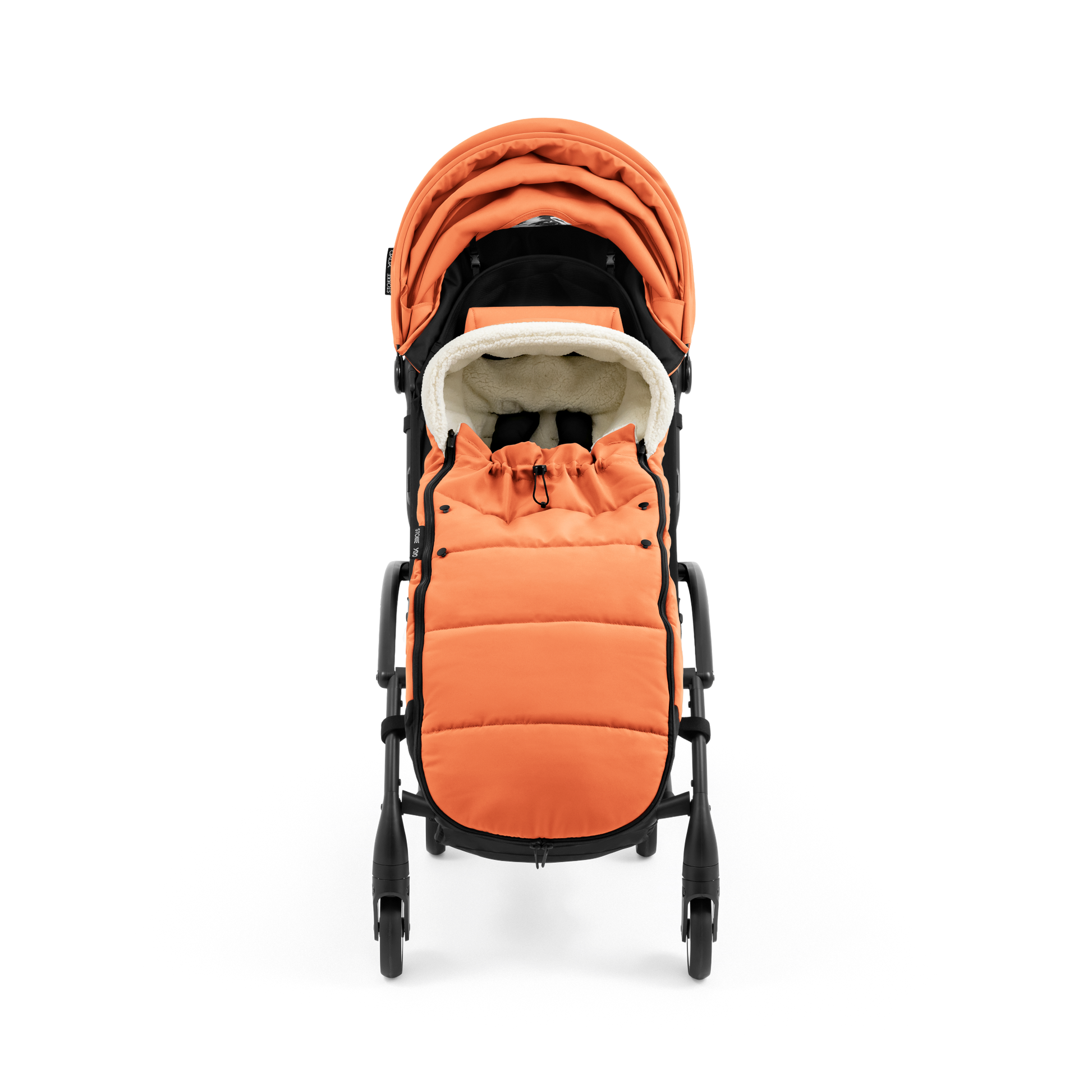 A stroller with a orange colored padded footmuff, cream fleece lining, and a black frame, shown from the front on a white background.