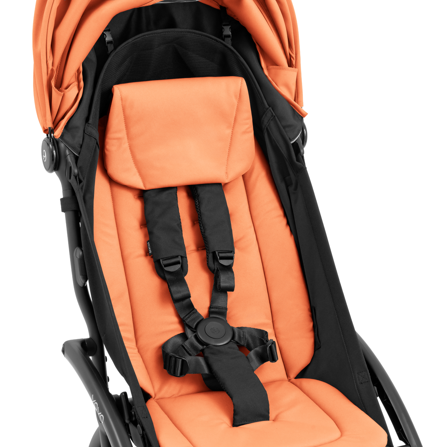 A compact baby stroller with an orange  canopy and orange padded seat, with a blacked out chassis, shown on a plain white background.