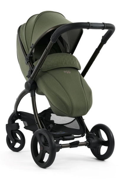 Egg 3 Pushchair & carrycot in Sage Green colourway, complete with all babies essential including car seat, tripp trapp highchair, crib and bath.