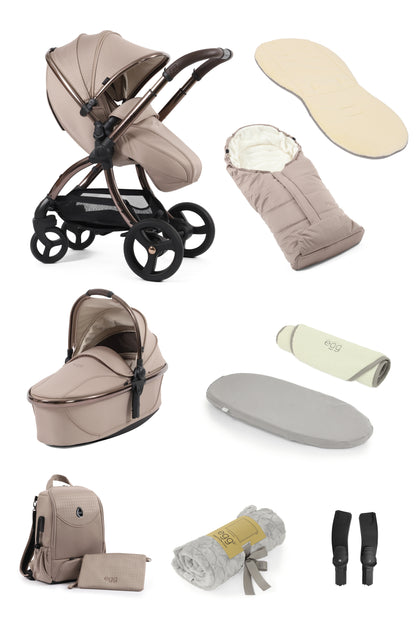 Egg 3 stroller, carrycot and snuggle package accessories in Houndstooth Almond.