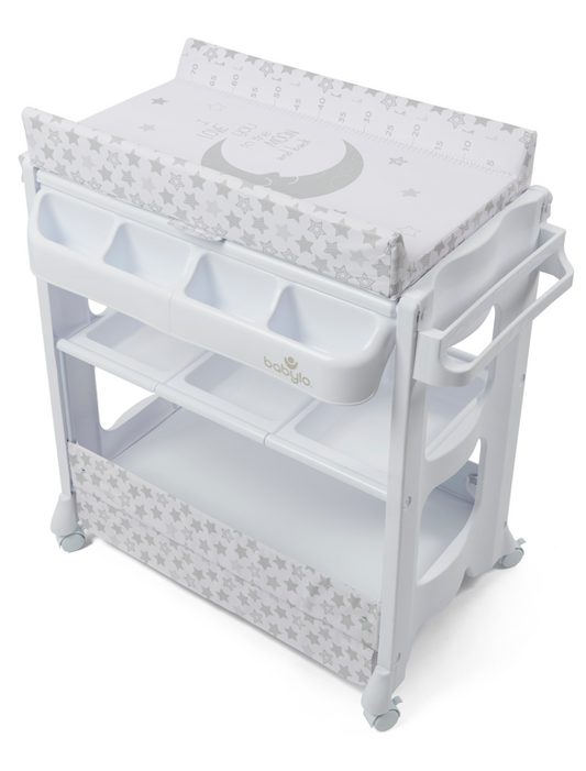 A baby changing table incorporating a changing station, bath, and storage for organised baby care.