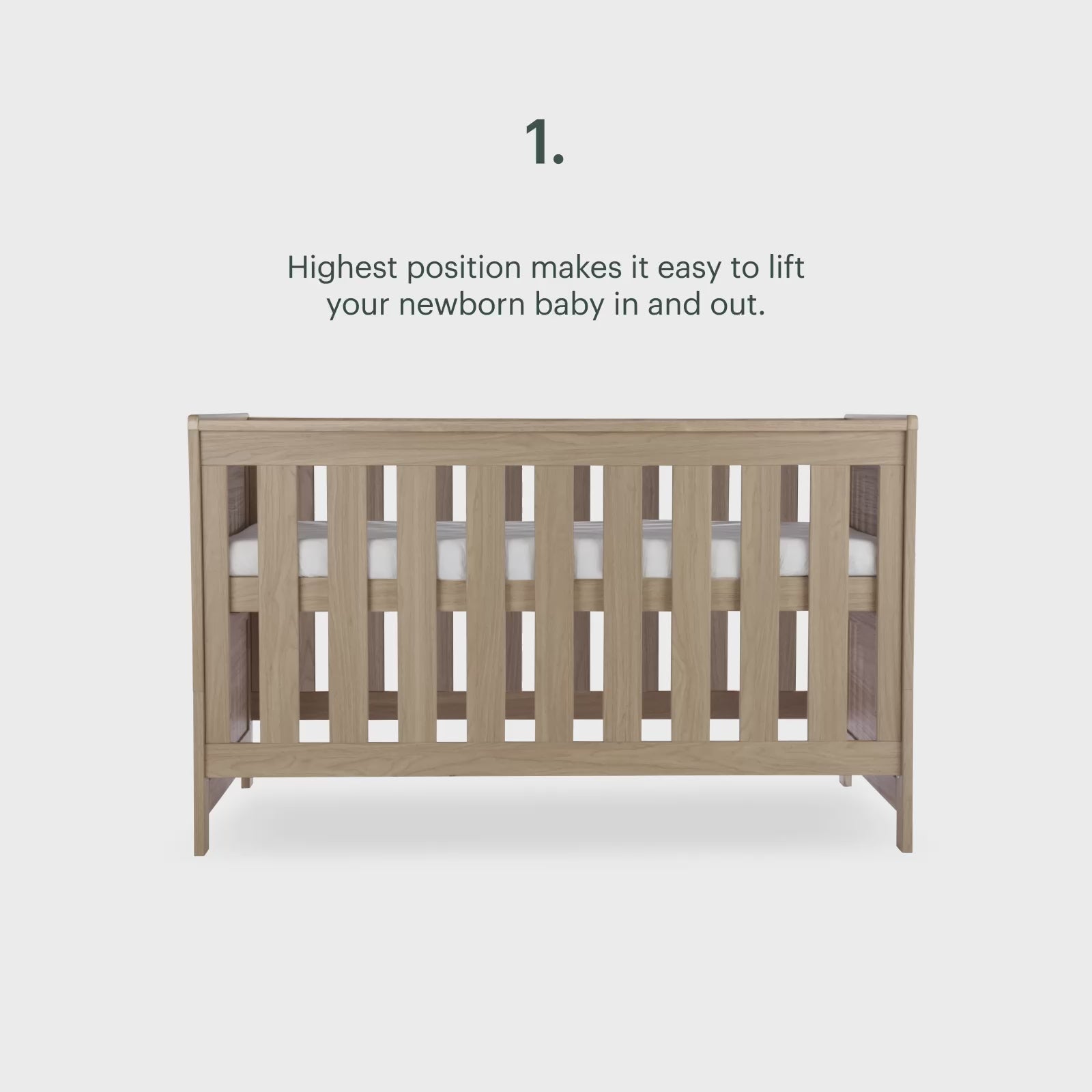 CuddleCo Burford cot bed in an oak finish.